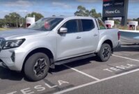 New Diesel ute hauling boat obstructs Tesla Supercharger bays for hours